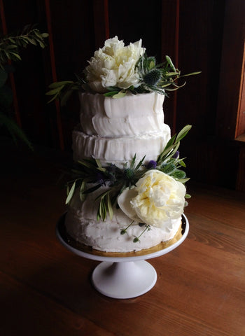 Wedding cake with white peonies and olive by Gorgeous and Green