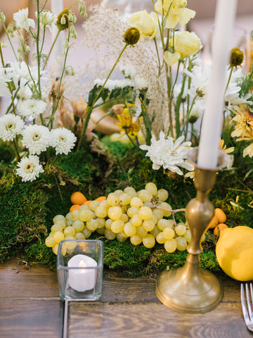 Table details with grapes and flowers and moss for Wedding Reception at Hacienda de las Flores by Gorgeous and Green