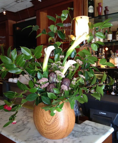 calla and artichoke arrangement for local farm to table restaurant in Berkeley