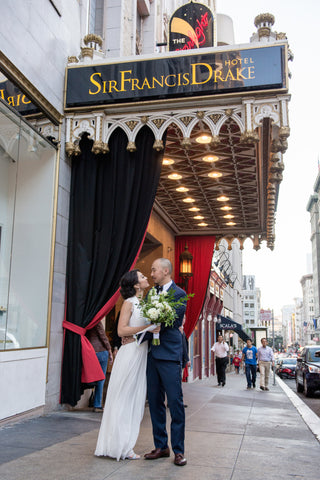 The couple with Gorgeous and Green florals at the Sir Francis Drake Hotel