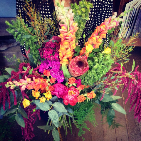 a closeup of a buffet table arrangement for a colorful wedding at the Brazilian Room by Gorgeous and Green