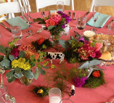 Colorful and wild centerpiece with animals for wedding at the Brazilian Room, florals by Gorgeous and Green