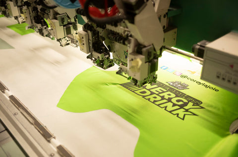 A machine creating bespoke embriodery for a race suit