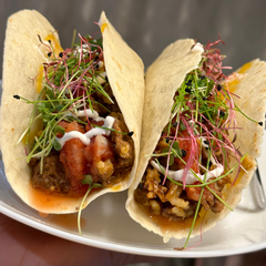 tacos with microgreen garnish