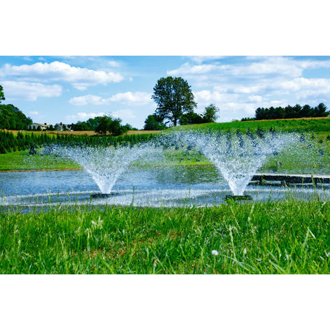 Two F500F half HP Bearon Aquatics Power House Aerating Fountains side by side in pond