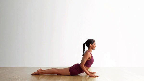 girl doing cobra pose-Bhujangasana-mikkoa yoga
