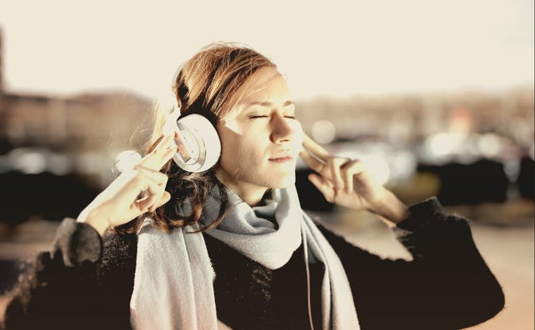 women listening to music-mikkoa yoga