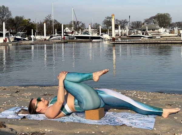 women doing Pilates using Yoga block-travel checklist for next travel-mikkoa yoga