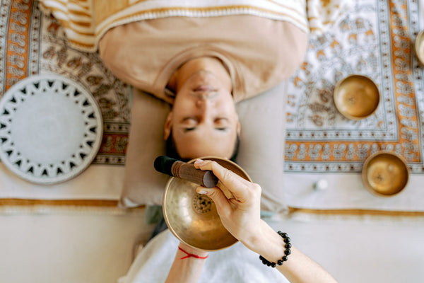 man listening to music-sound bath therapy-mikkoa yoga