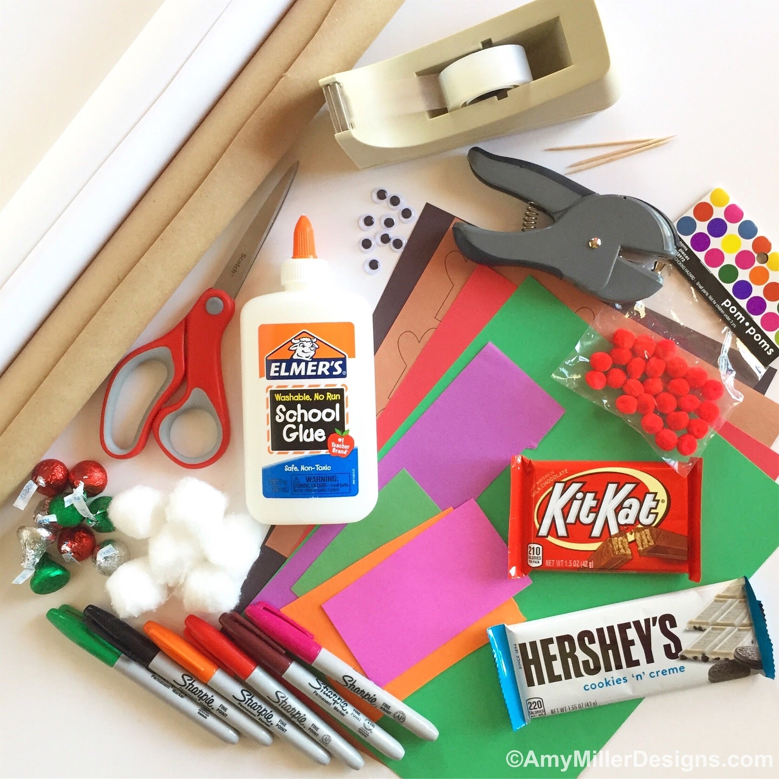 Supplies used to make christmas candy bar wrappers