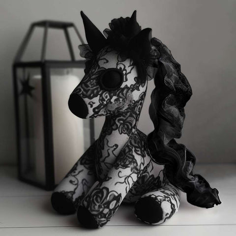 Black unicorn stuffed animal