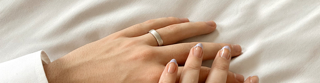 wedding band on ring finger