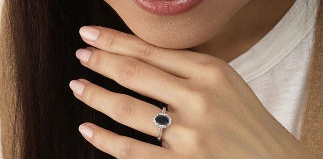 black diamond ring on hand