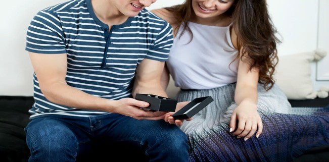 couple looking at rings