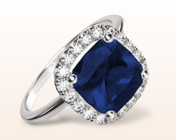halo engagement ring with sapphire