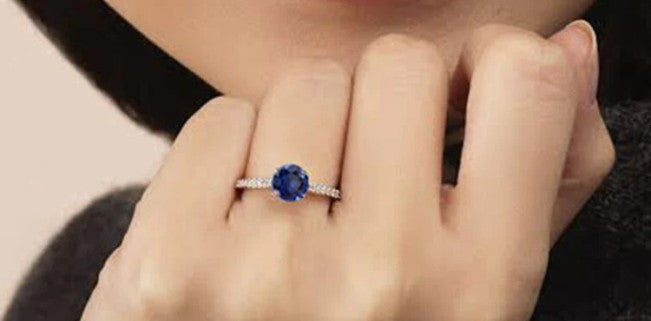 sapphire ring on hand
