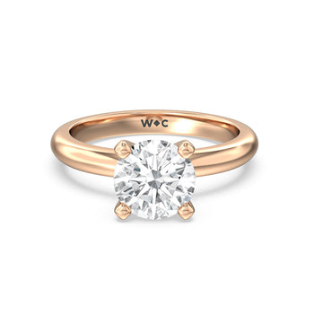 Classic Four Prong Solitaire Diamond Engagement Ring