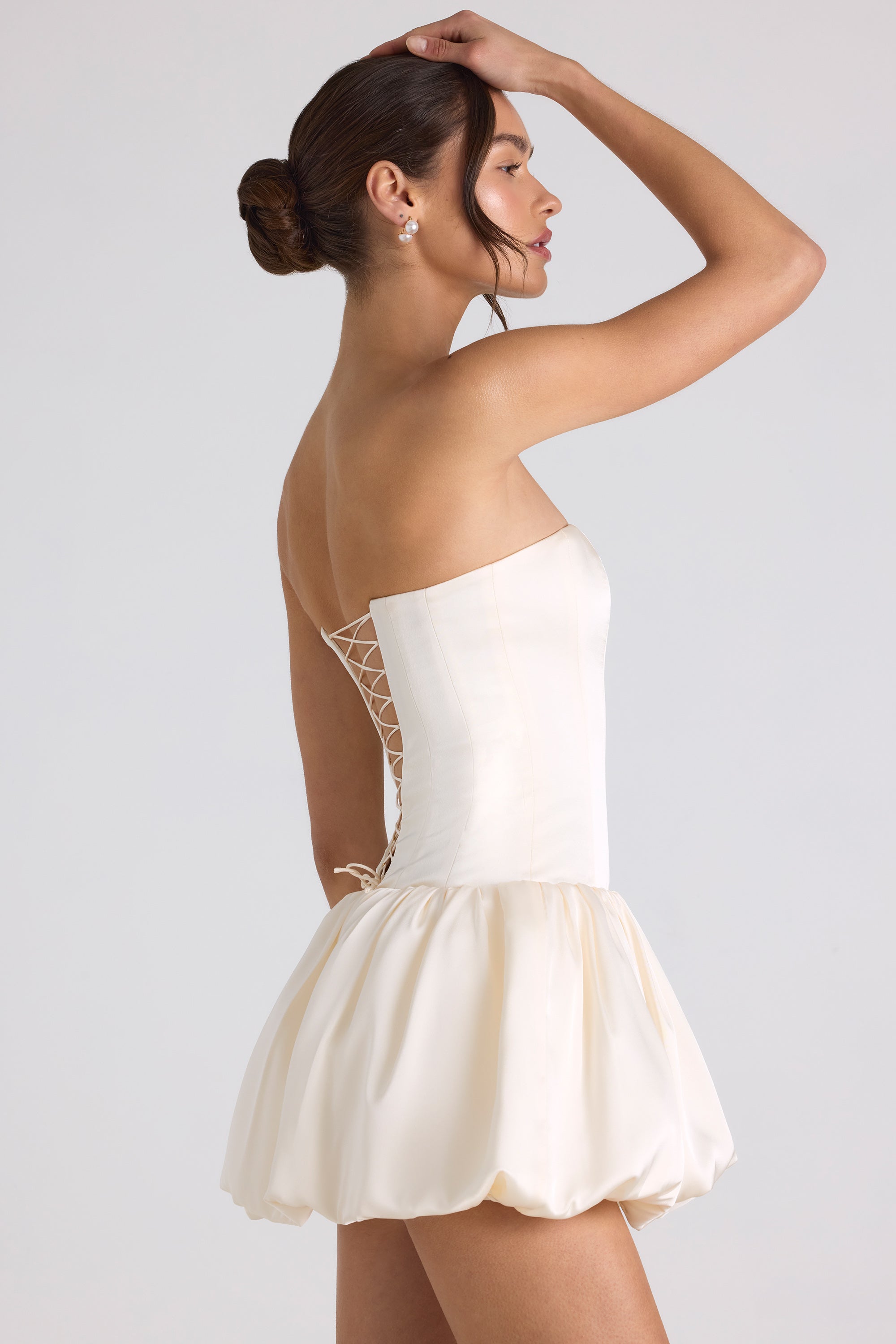 Lace-Up Bubble Hem Corset Mini Dress in Ivory