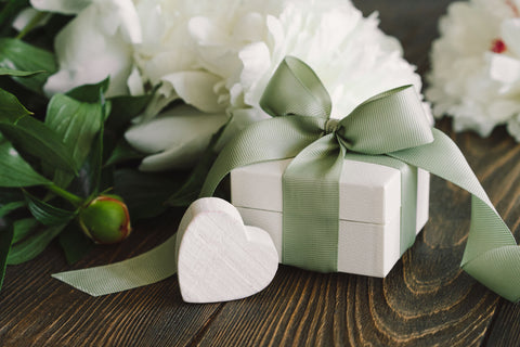 Wedding Gift wrapped in green bow with flowers