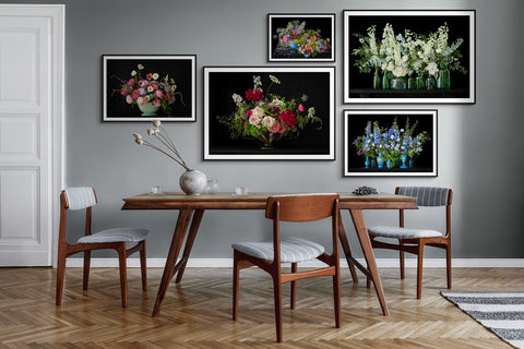 Mid century modern style interior showing the 4 sizes of photographic prints available to order, presented framed on the wall in classic black gallery frames.