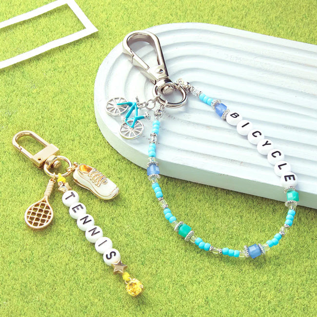 Two kinds of key chains of sports charms