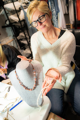 Bobbi showing a finished necklace