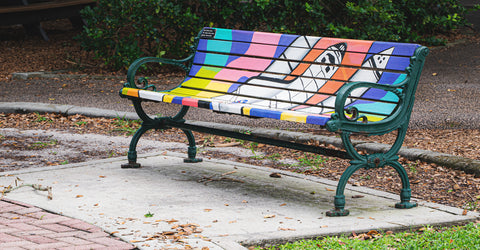 park bench with rocket painted illustrations from space coast florida