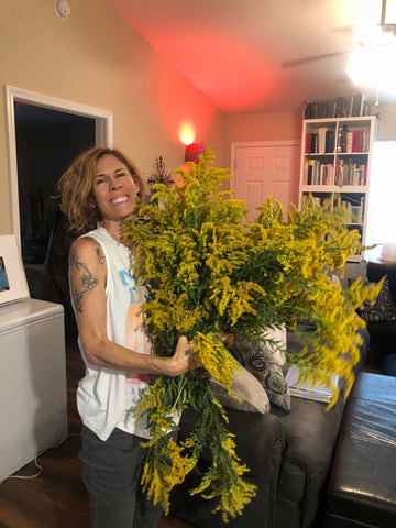 Michelle-with-freshly-picked-goldenrod-solidago.jpg