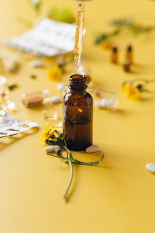 Herbal extracts and droppers in glass bottles