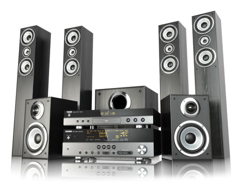 Four vertical speakers surrounding three shorter speakers with a home entertainment system receiver