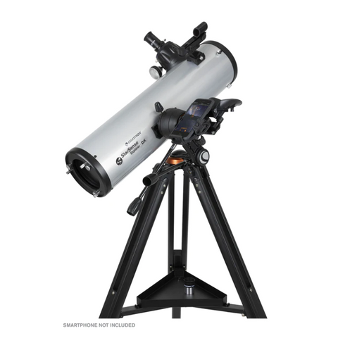 Starsense Explorer Dx130AZ on its tripod slightly facing right and pointed to the sky.