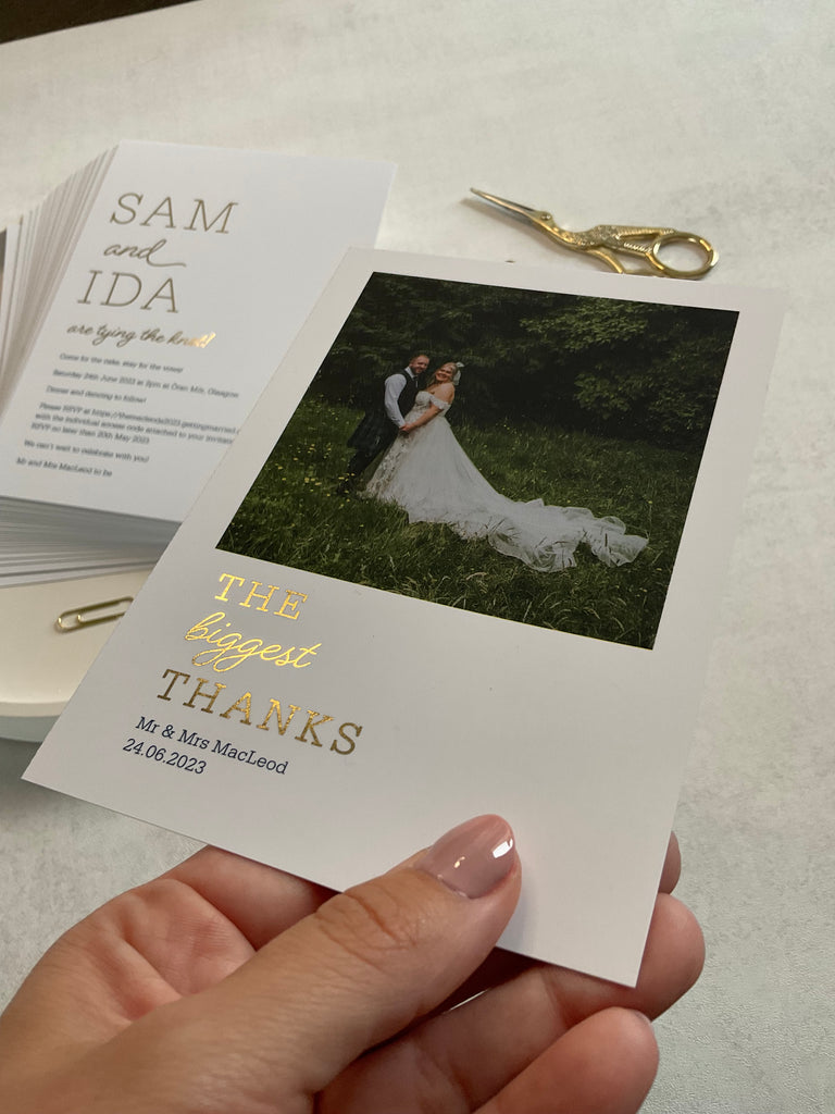 Wedding thank you cards with photo of bride and groom and gold foil text