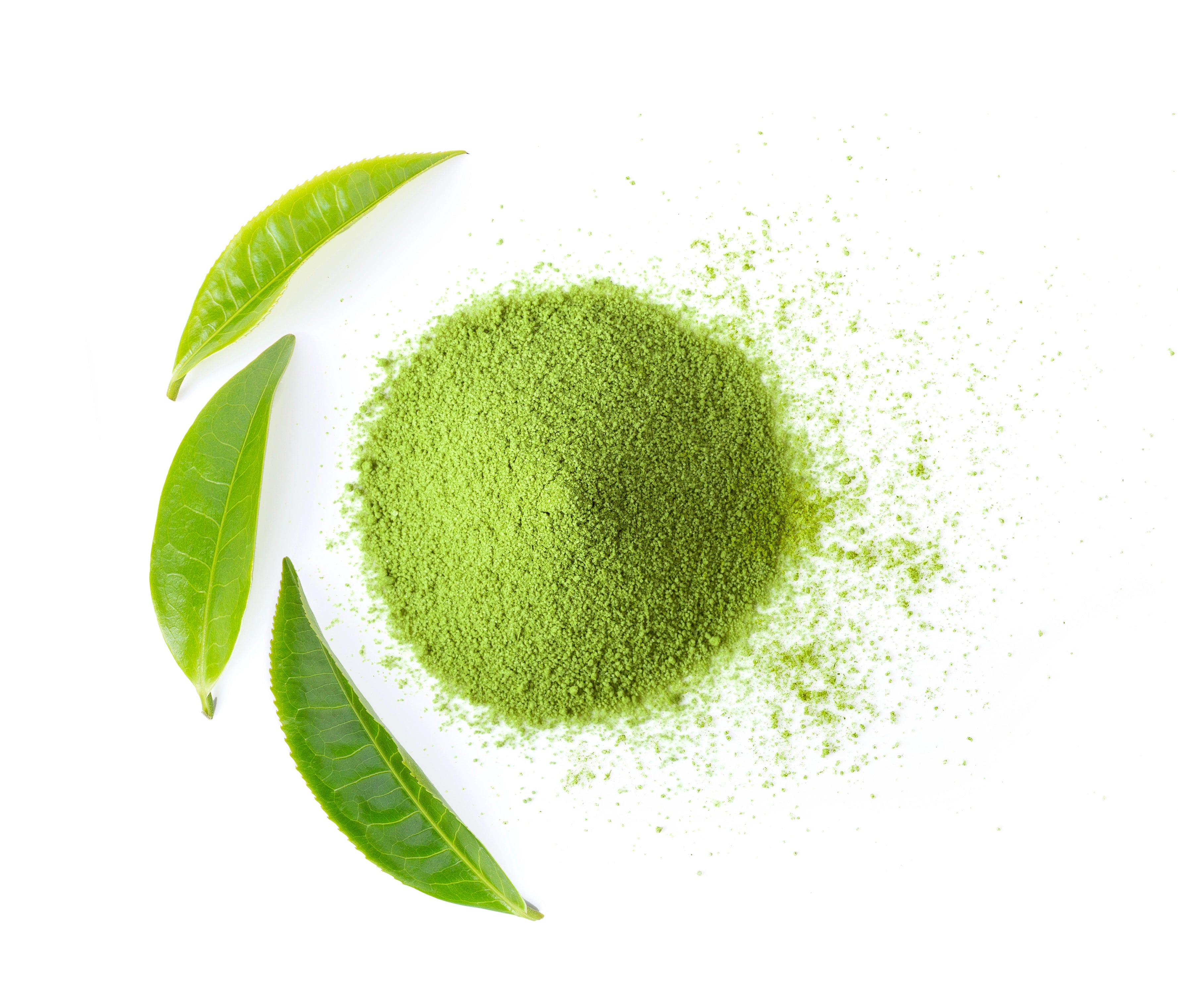 matcha-green-tea-powder-with-leaves-white-wall