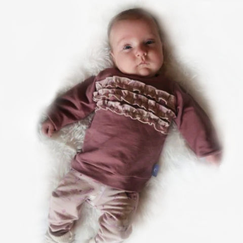 Sammlungsbild von Babykleidung, nachhaltig handgefertigte Kinderkleidung, Webshop Cuteez