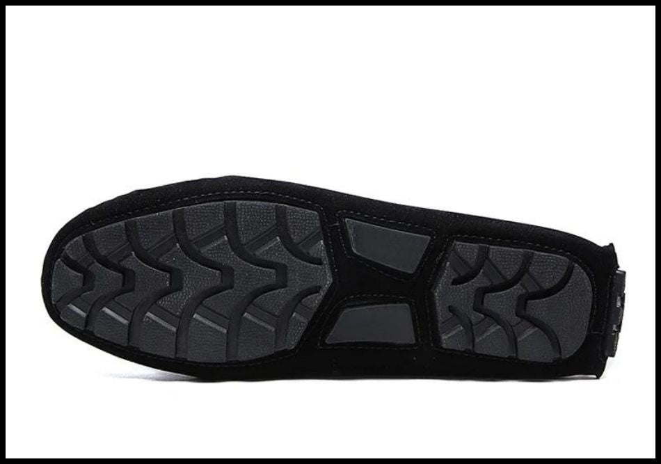 Men’s casual loafers by DEKABR, showcasing intricate sole design for enhanced grip and safety.
