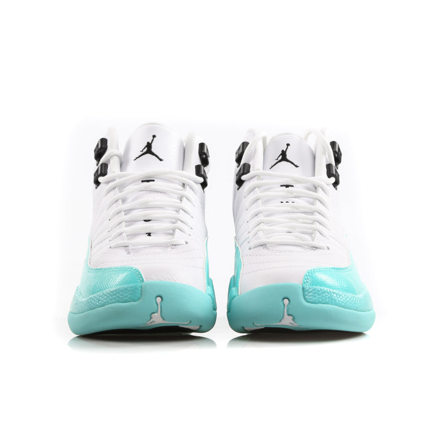 Nike Air Jordan 12 Retro Light Aqua sneakers in the white colorway with aqua green upper and sole insert