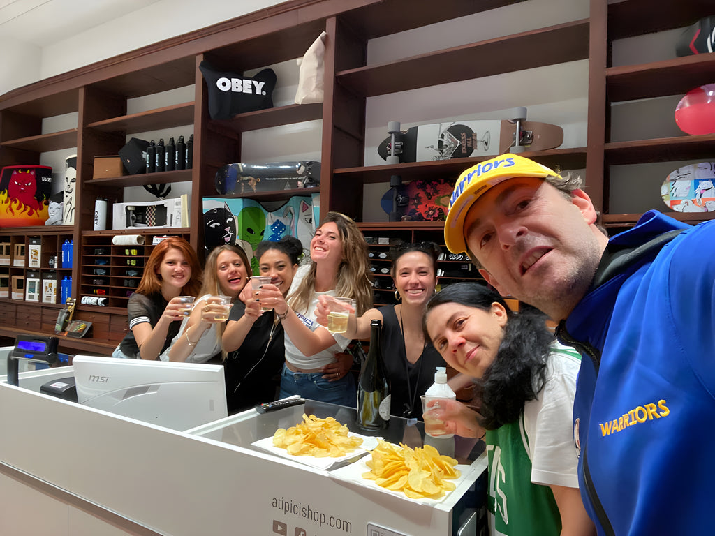 Staff ATIPICI Shop Bologna celebrates the inauguration of the store