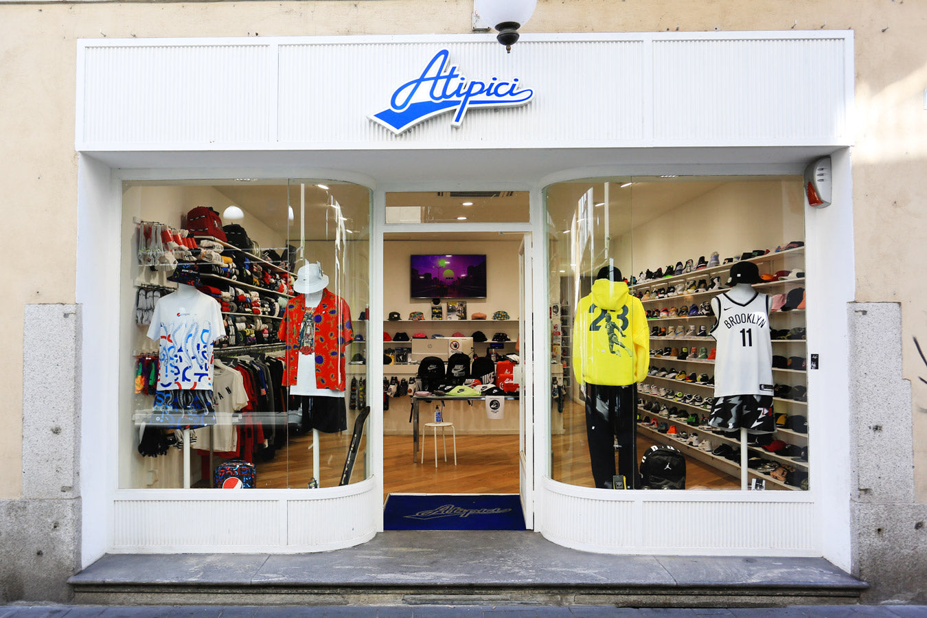 Exterior of the new streetwear clothing store, sneakers from the best urban brands, caps and accessories by Atipici Shop Novara in Corso Italia 17