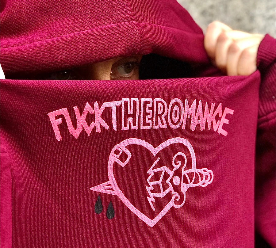 Detail of the purple sweatshirt from the Fabri Fibra x Hero's Heroine Fucktheromance capsule