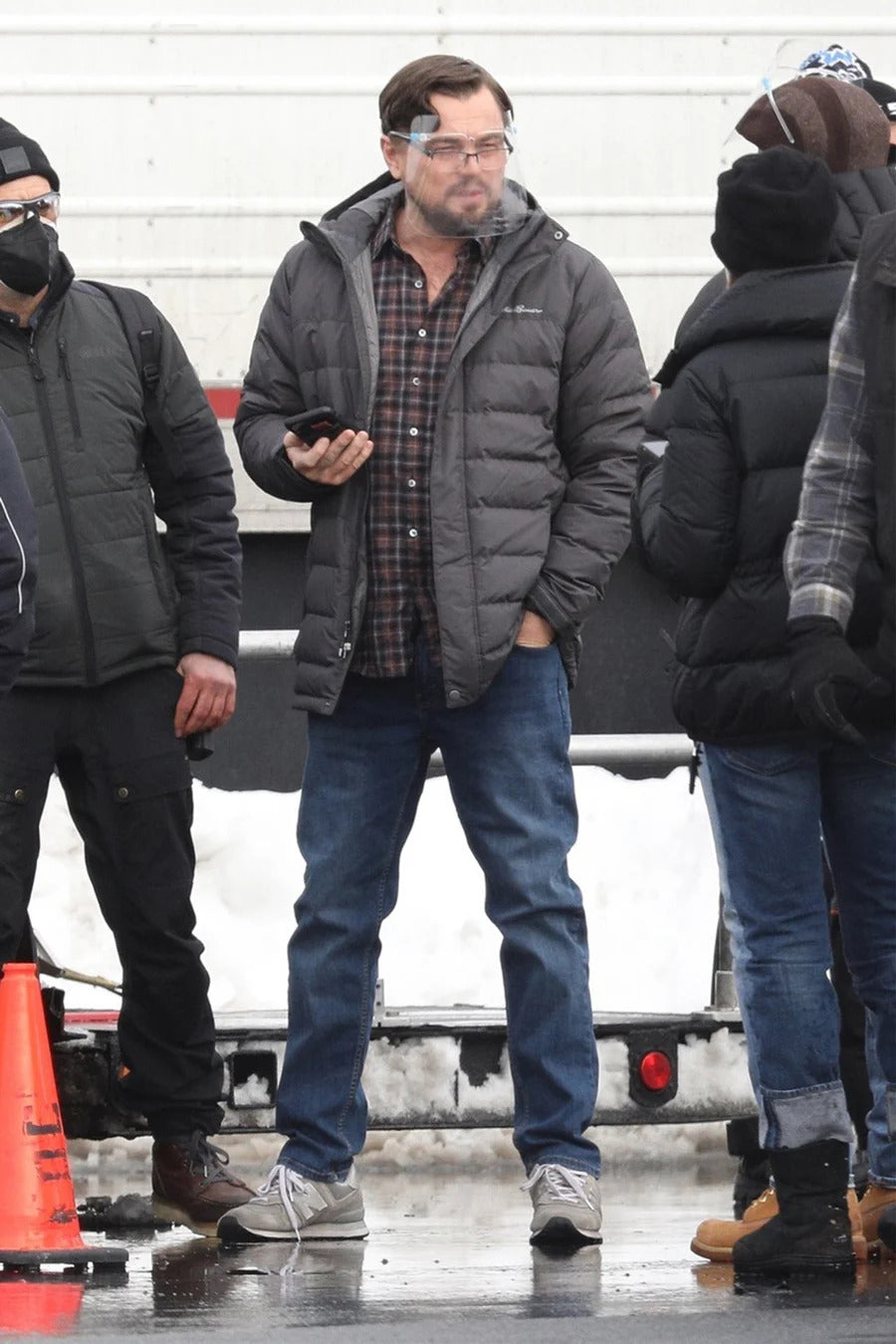 Leonardo DiCaprio wears gray New Balance 574s on the set of Don't Look Up
