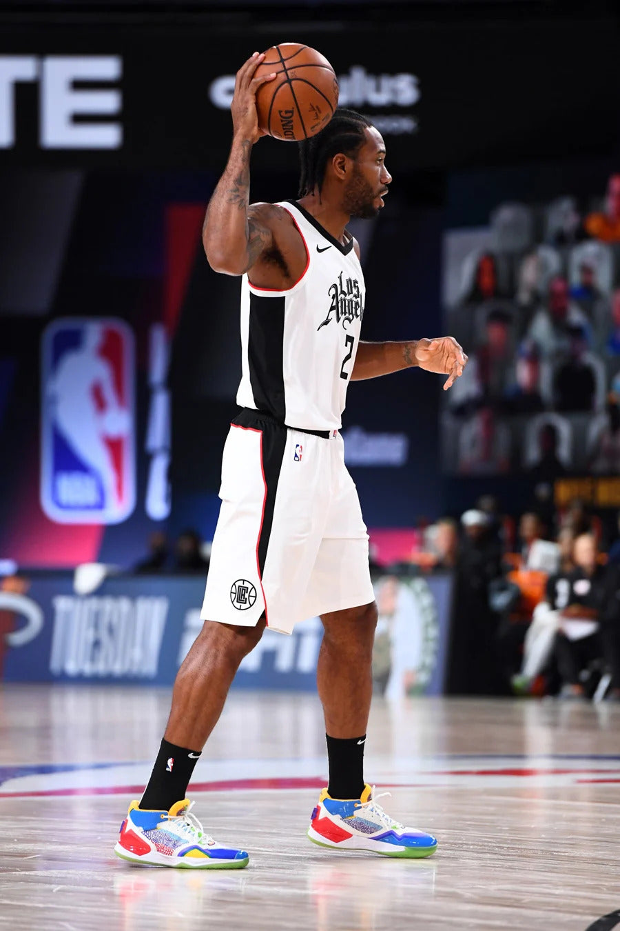 Kawhi Leonard wears New Balance Kawhi signature basketball shoes on NBA basketball during a game