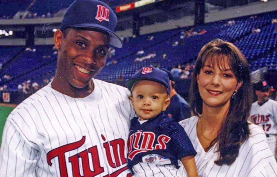 Patrick Mahomes Junior as a child with his family in the arms of his father, an MLB baseball player