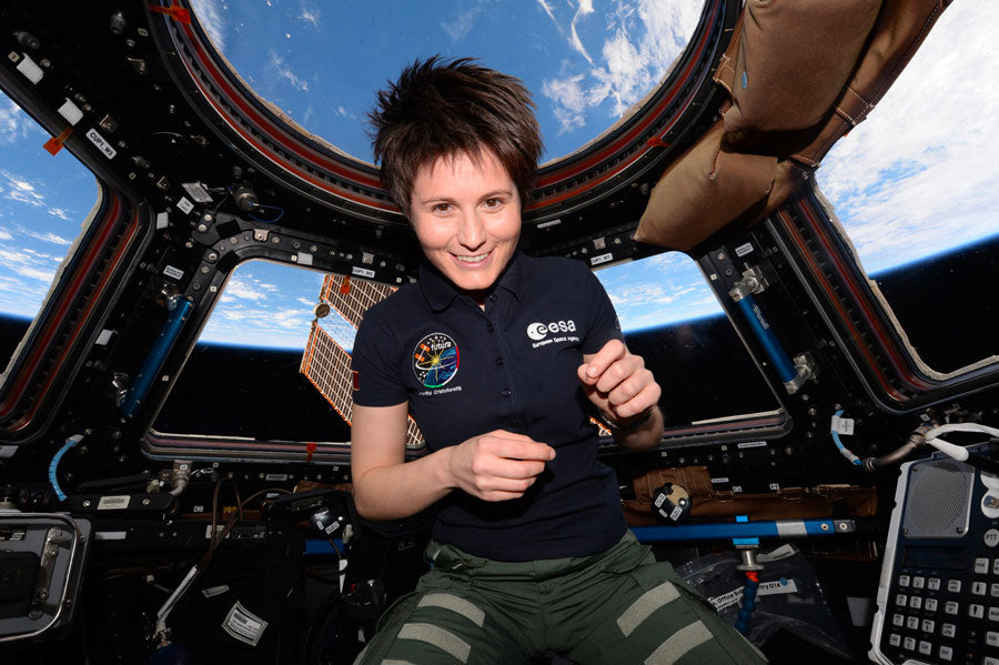 Samantha Cristoforetti smiles aboard the international space station ISS in zero gravity