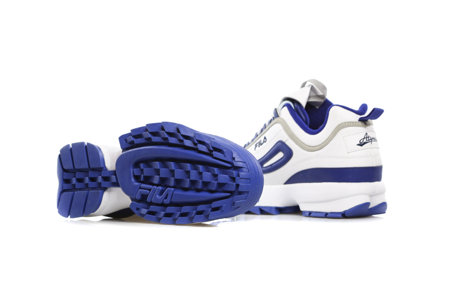 Pair of Fila x Atipici Disruptor sneakers with shaped platform in The Blueprint colorway in white and blue with girgio details