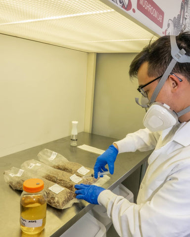 Shawn inoculating grain bags