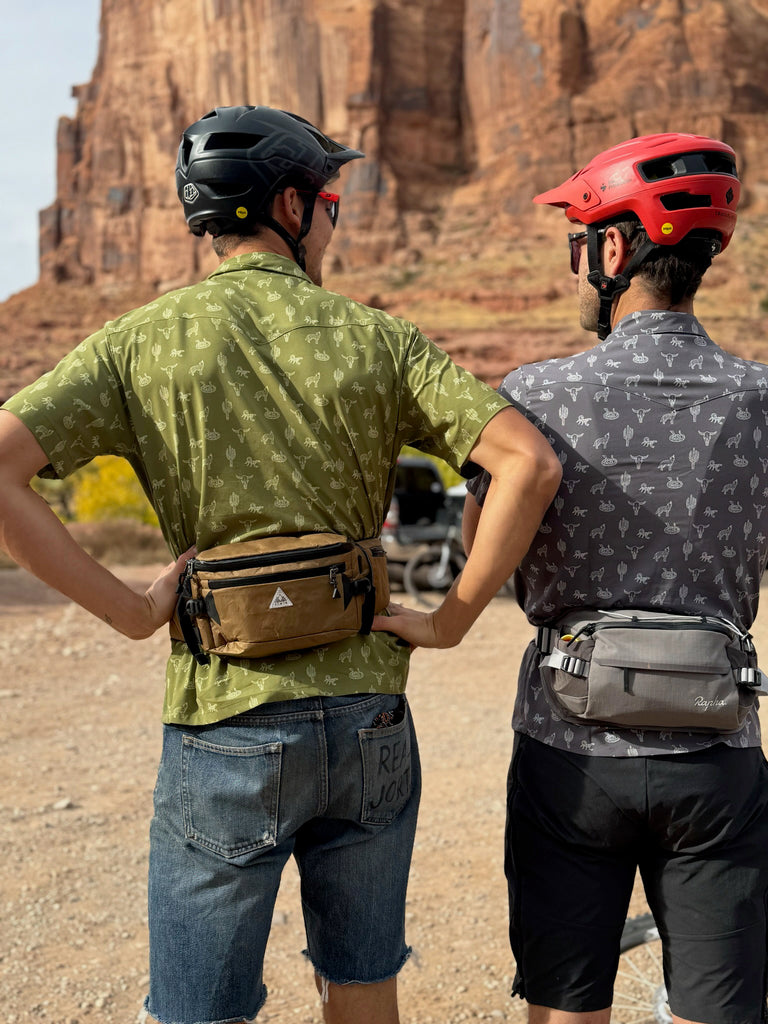 Two men wearing the bolo bike shirts