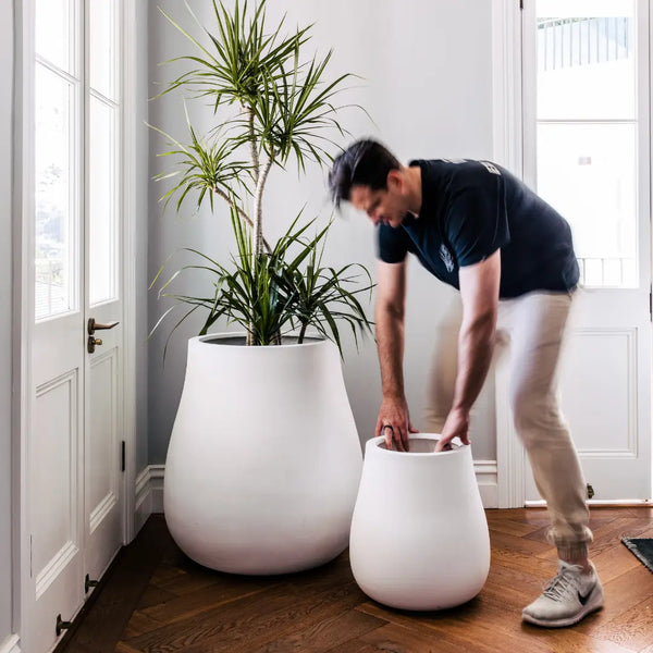 White garden pots indoors