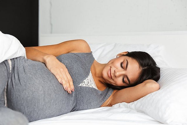 1. Pregnant woman going to sleep