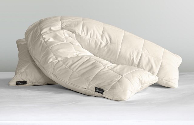 11. cosy, woollen, V-shaped pillow