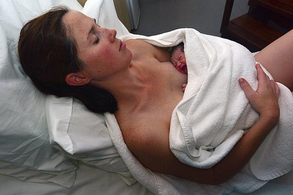 2. Mother and new born baby minutes after giving birth